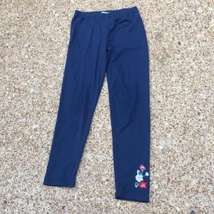 Girls medium blue leggings with flower pattern